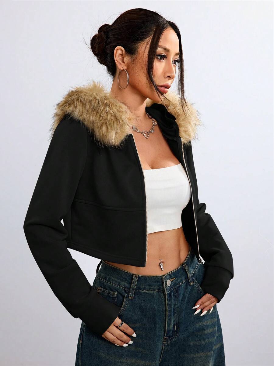 Front view of women's black zip-up hooded crop top with long sleeves and fuzzy faux fur fleece details