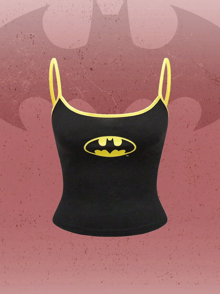 Black cropped cami top featuring a graphic print, spaghetti straps, rib-knit fabric with contrast binding, and a slim fit silhouette.