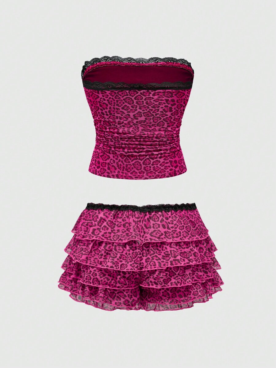 Y2K leopard print two-piece outfit with strapless bandeau top and ruffle mini shorts, featuring contrast lace and a slim fit