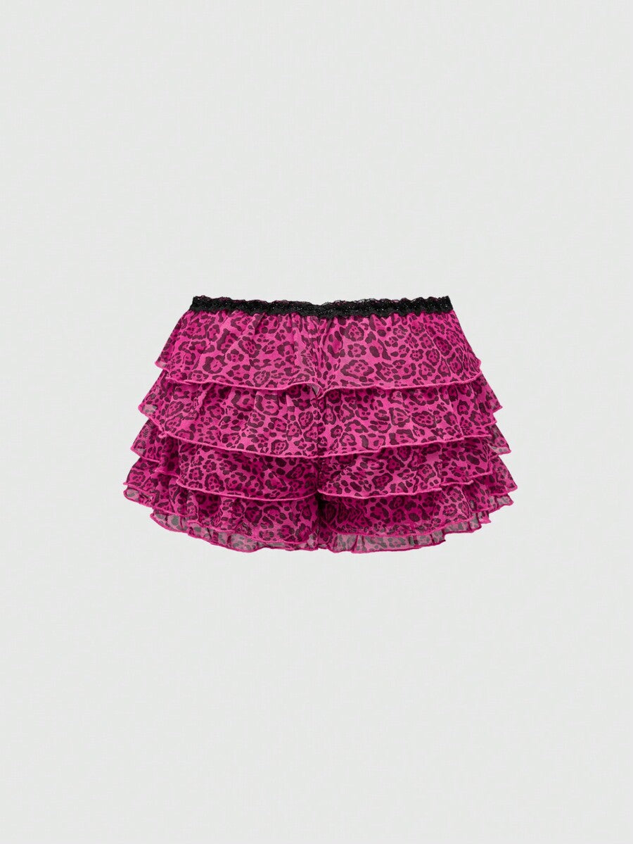 Y2K leopard print two-piece outfit with strapless bandeau top and ruffle mini shorts, featuring contrast lace and a slim fit