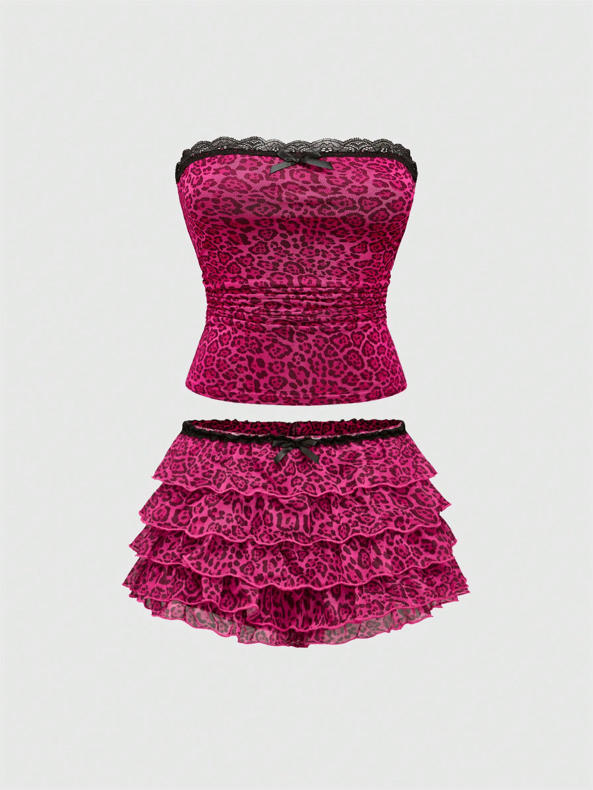 Y2K leopard print two-piece outfit with strapless bandeau top and ruffle mini shorts, featuring contrast lace and a slim fit