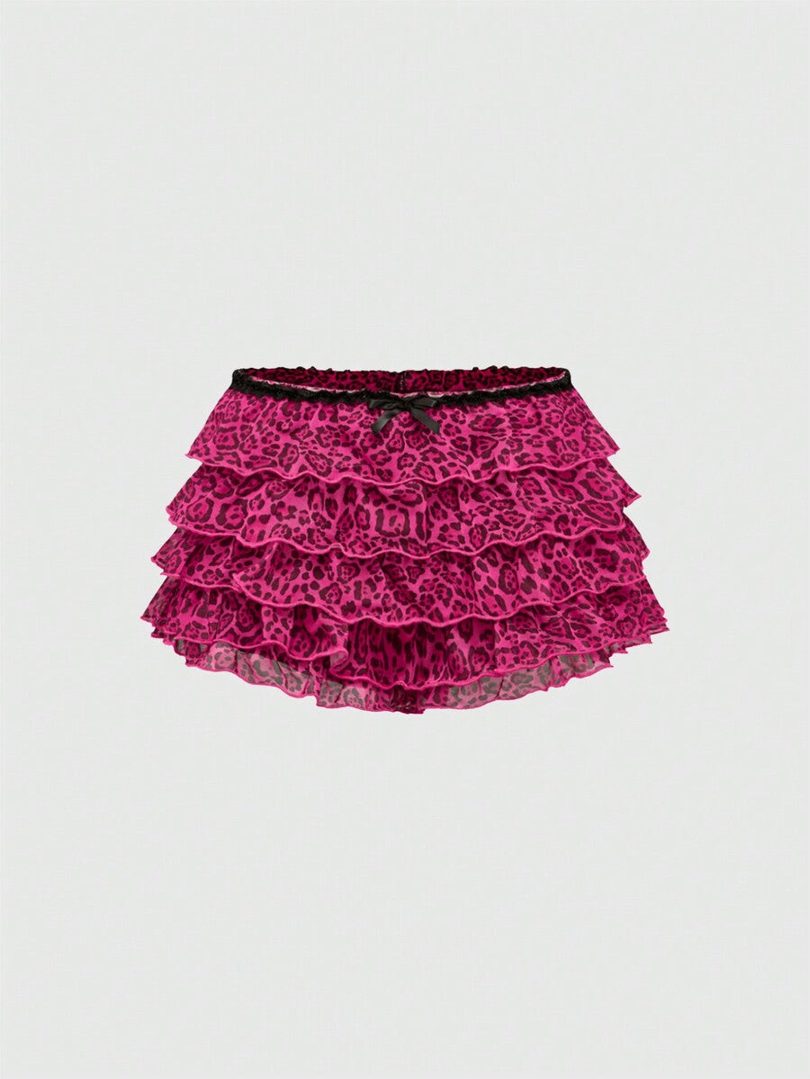 Y2K leopard print two-piece outfit with strapless bandeau top and ruffle mini shorts, featuring contrast lace and a slim fit