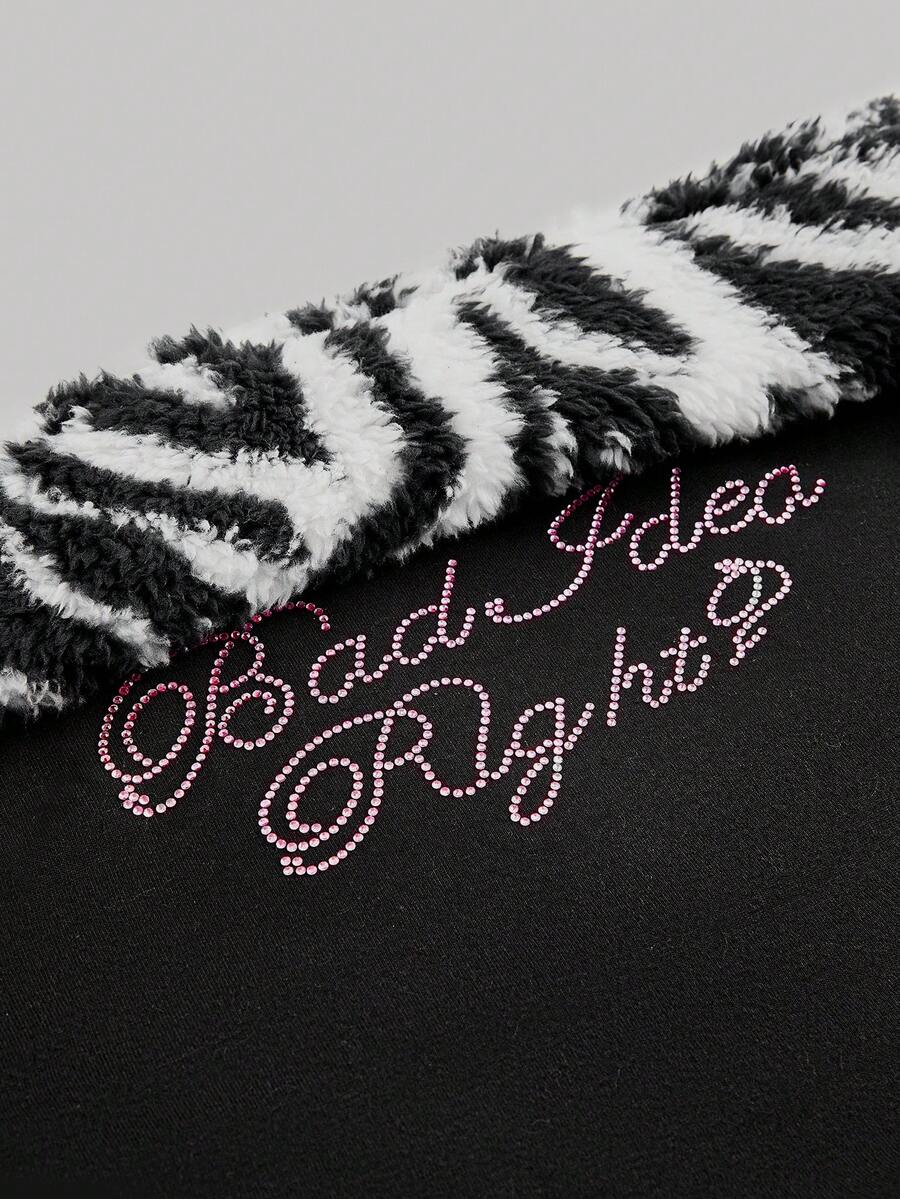 Women's black Y2K zebra print rhinestone 2-piece loungewear set with strapless camisole and mini shorts