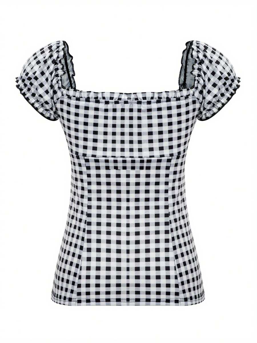 Women's black and white plaid short sleeve blouse featuring a tie-front front bow, contrast lace frill trim, raglan sleeves, and sweetheart neckline.