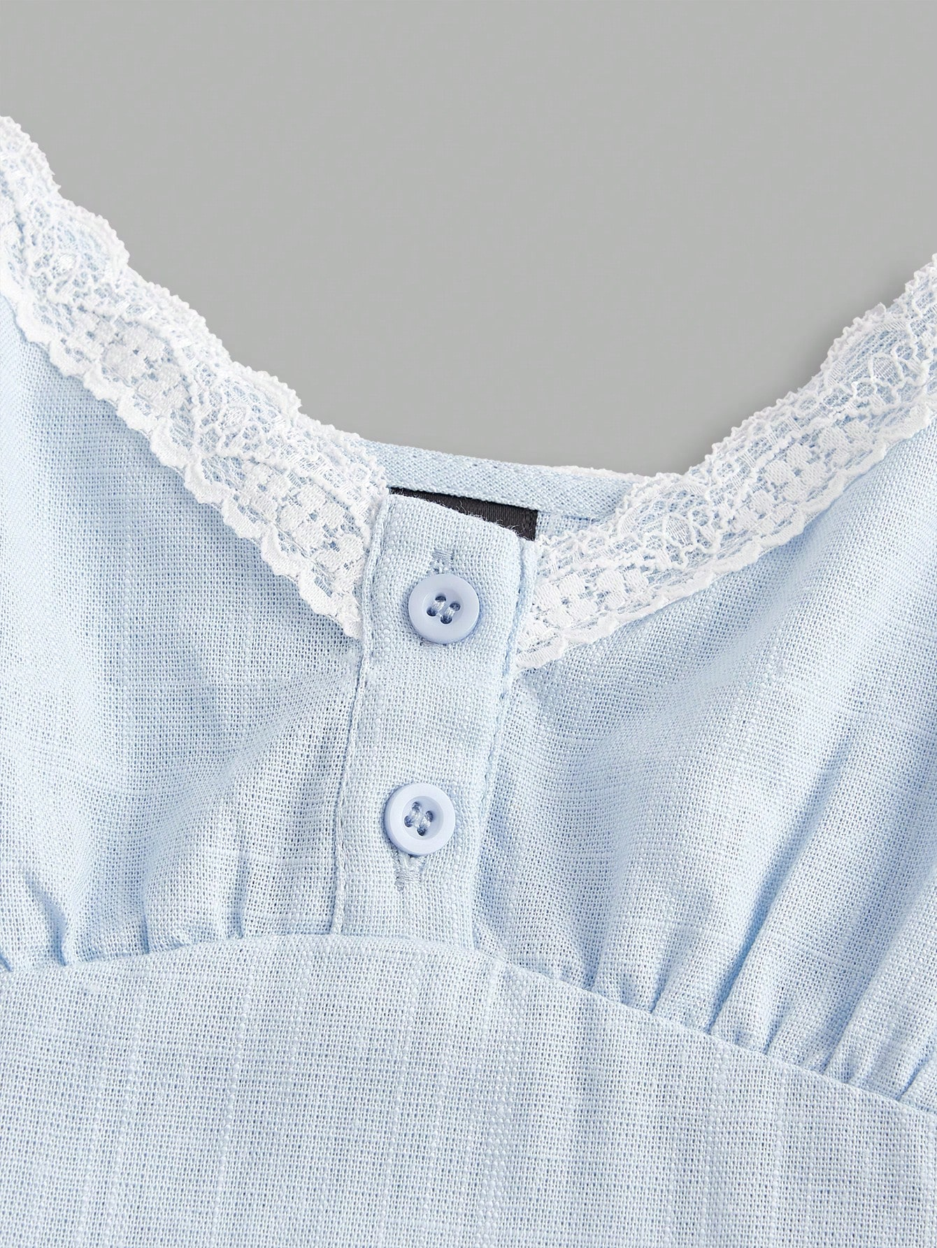 Women's spaghetti strap cami top with lace patchwork, rib-knit detail, button front, regular hem, and semi-sheer woven fabric