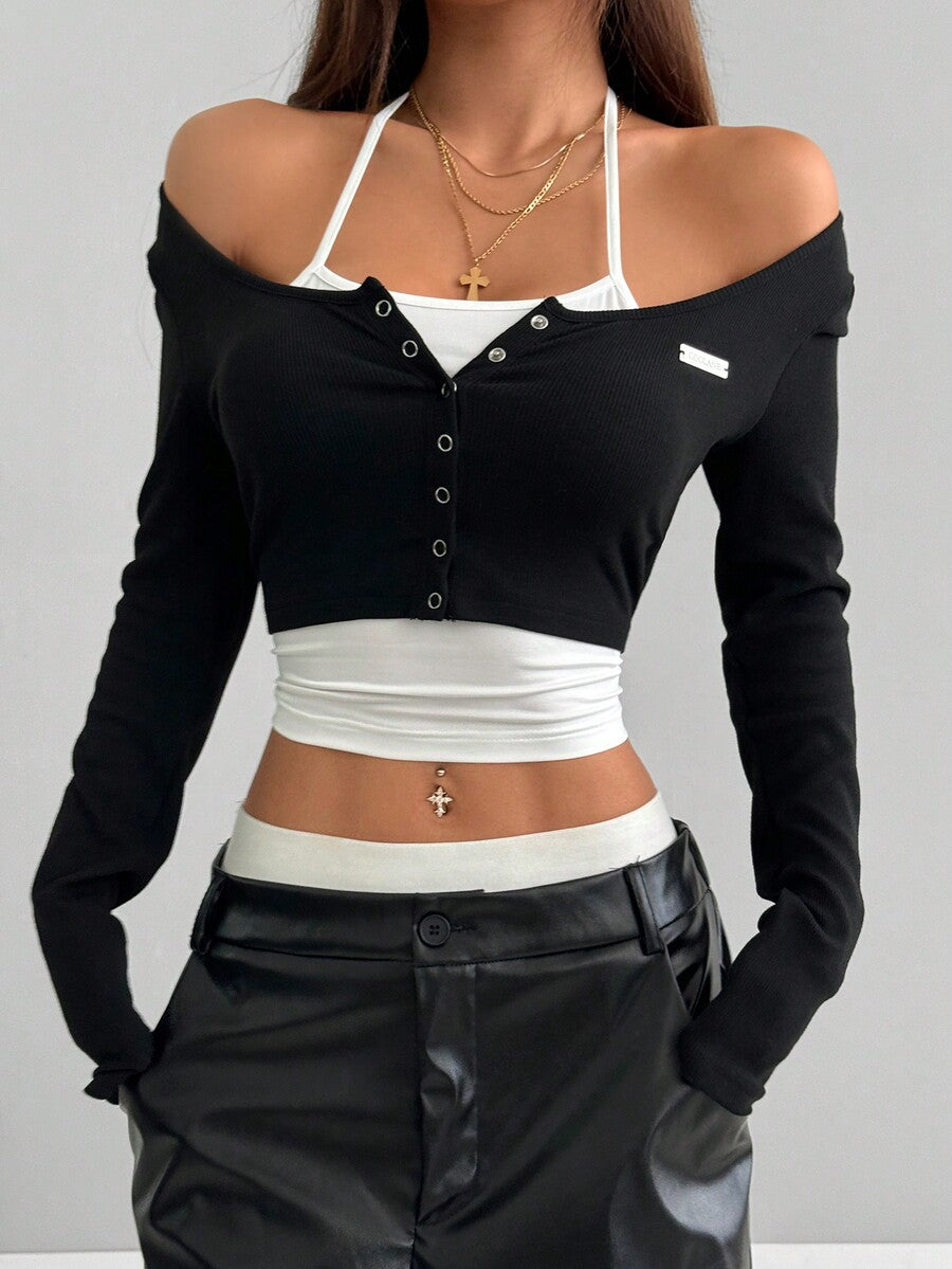 Women's black and white cropped Y2K-style top with lace-up camisole look, halter neckline, long sleeves, button front, rib-knit texture, and slim fit