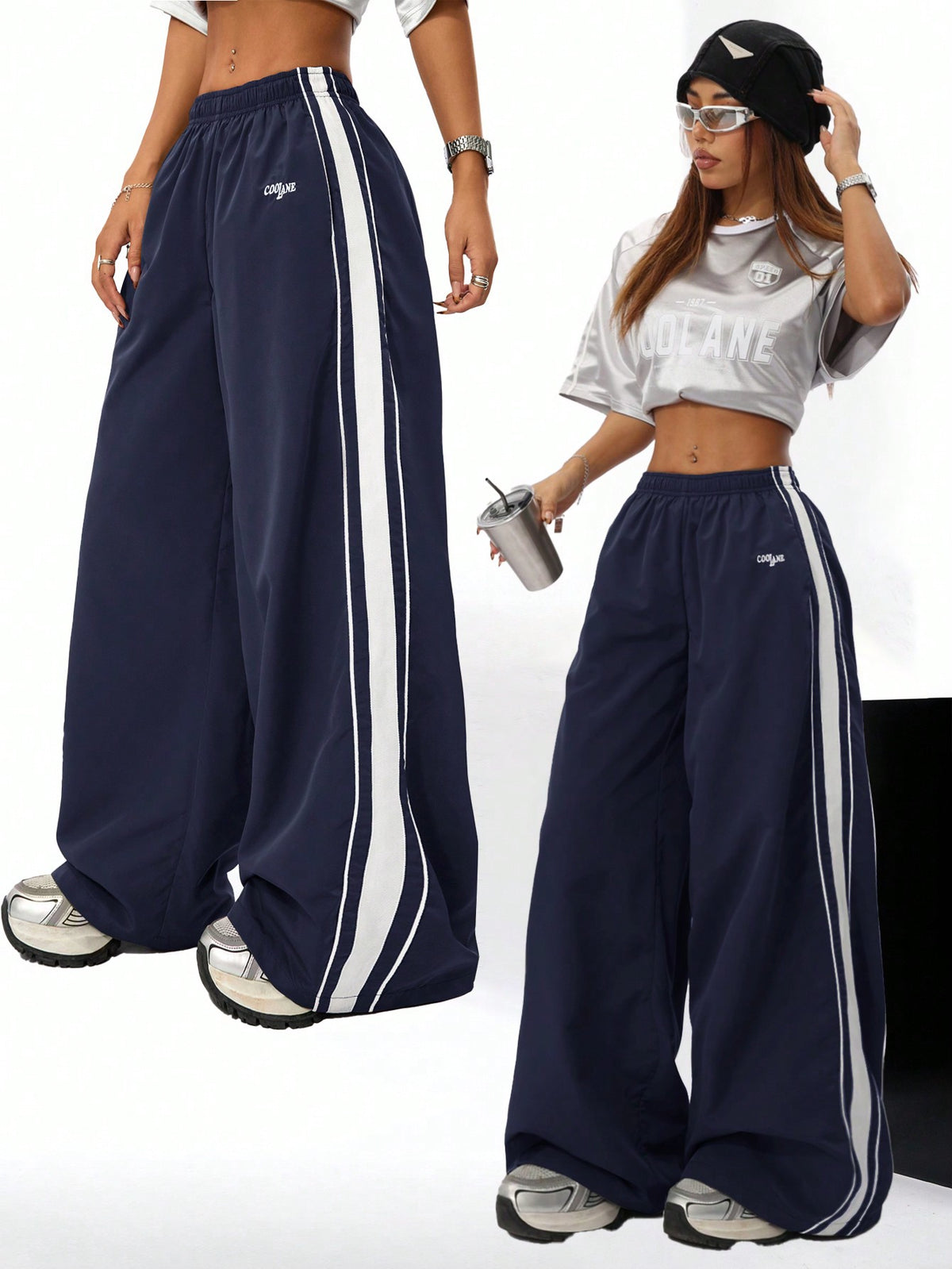 Women's navy blue wide leg sweatpants with casual loose fit, side stripe detail, and elastic waist