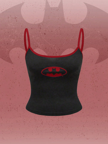 Black cropped cami top featuring a graphic print, spaghetti straps, rib-knit fabric with contrast binding, and a slim fit silhouette.