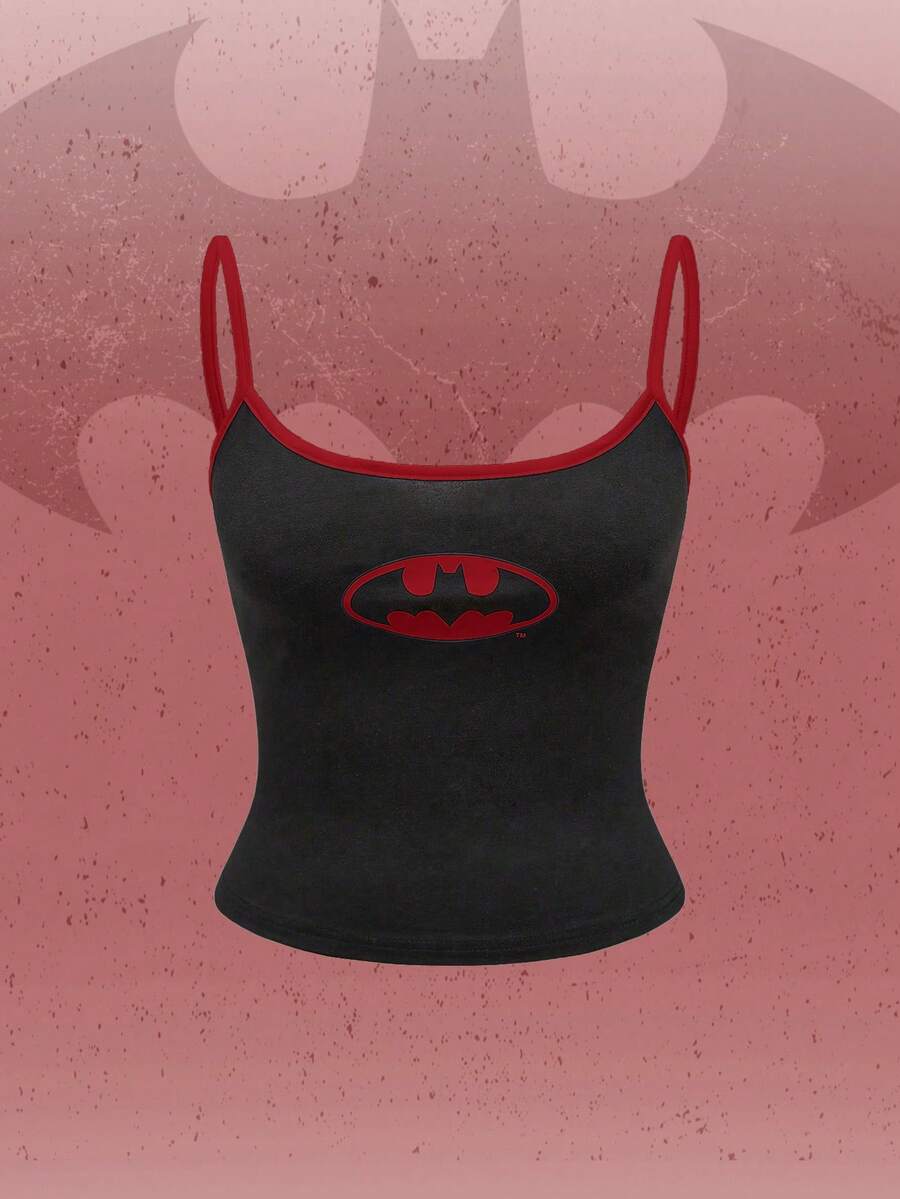 Black cropped cami top featuring a graphic print, spaghetti straps, rib-knit fabric with contrast binding, and a slim fit silhouette.