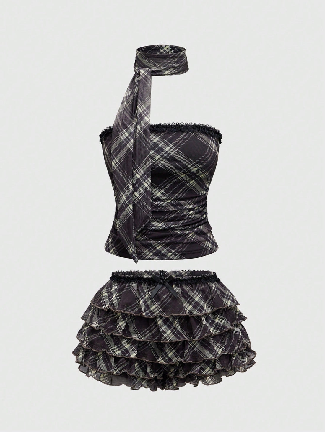 Women's brown plaid Y2K two-piece outfit featuring a strapless bandeau top with contrast lace and a matching mini shorts bottom.