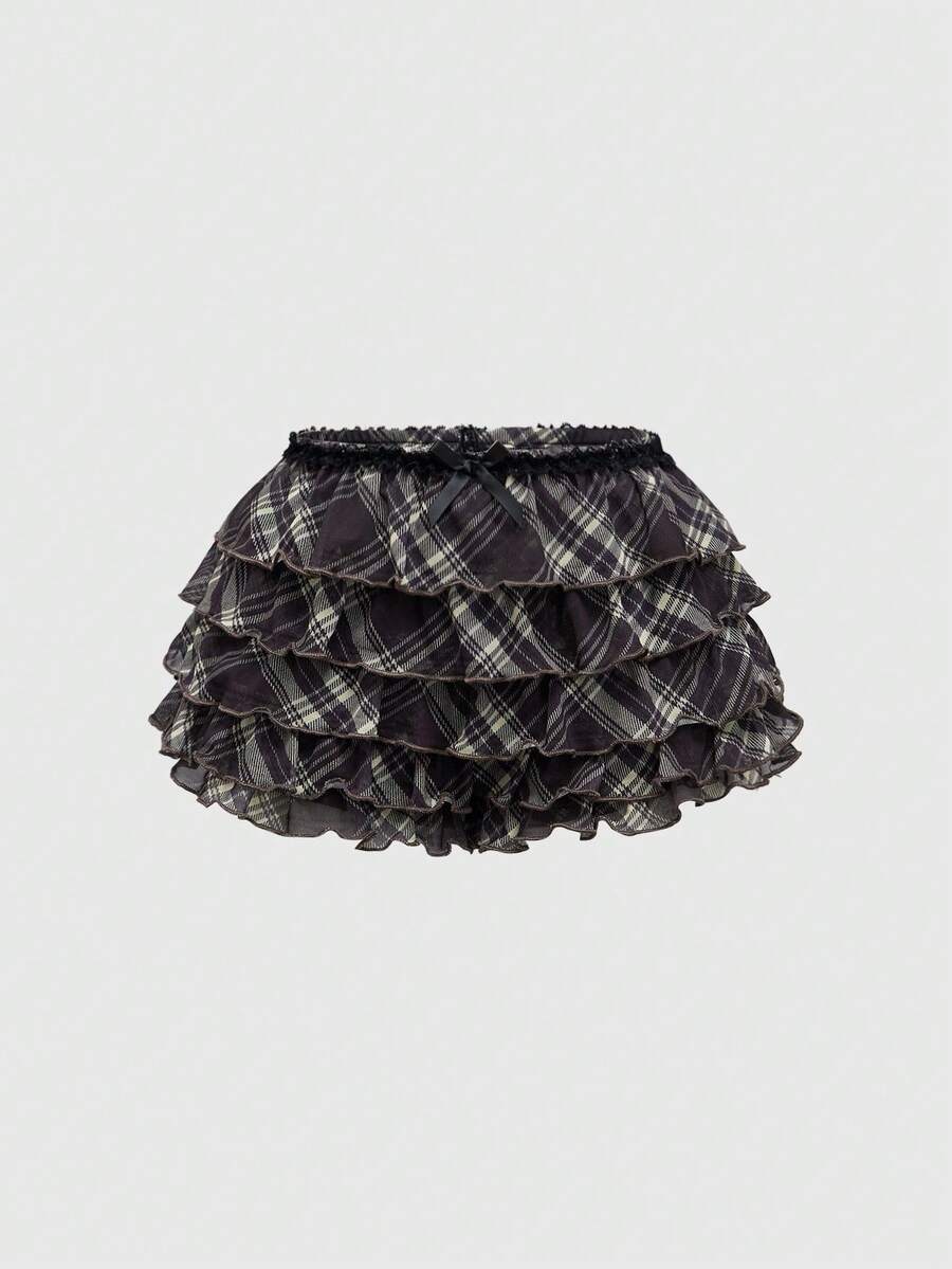 Women's brown plaid Y2K two-piece outfit featuring a strapless bandeau top with contrast lace and a matching mini shorts bottom.
