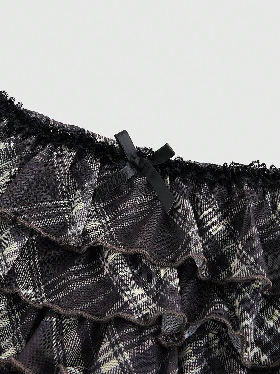 Women's brown plaid Y2K two-piece outfit featuring a strapless bandeau top with contrast lace and a matching mini shorts bottom.