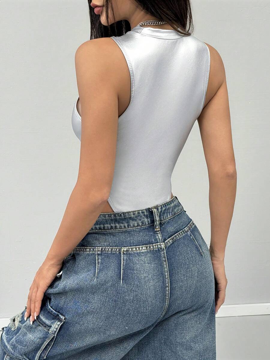 Women's slim fit sleeveless bodysuit with a stand collar and crisscross backless design in coated fabric.