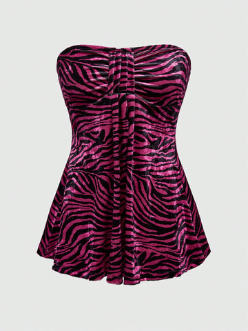 Women's strapless hot pink zebra print ruched tube top featuring a flared hem and slim fit knitted fabric.