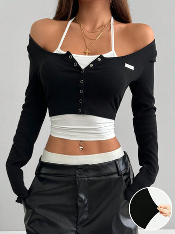 Women's black and white cropped Y2K-style top with lace-up camisole look, halter neckline, long sleeves, button front, rib-knit texture, and slim fit