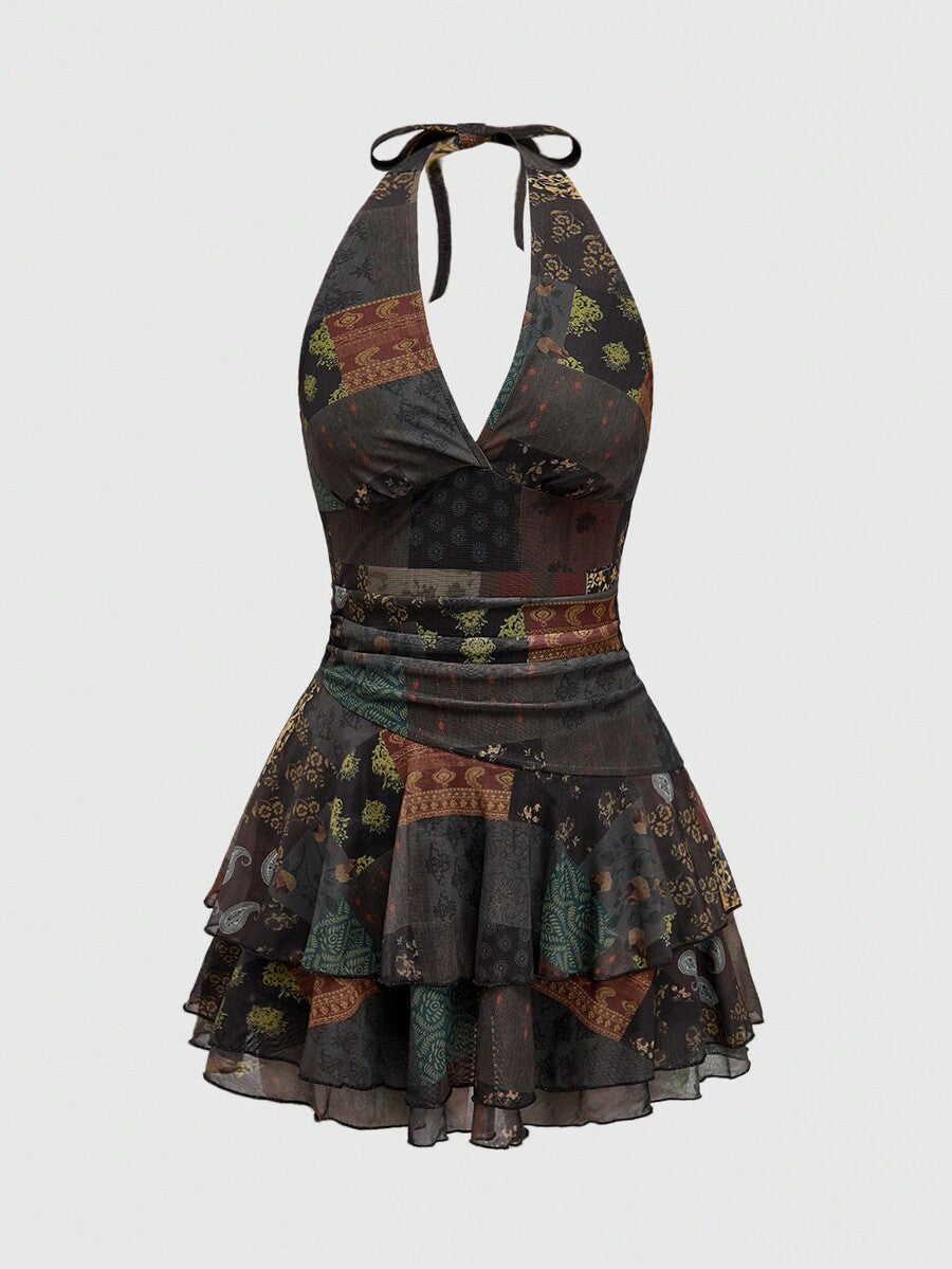 Women's brown boho halter mini dress with backless knot detail, slim fit bodycon shape, all-over mixed print, and layered tiered hem