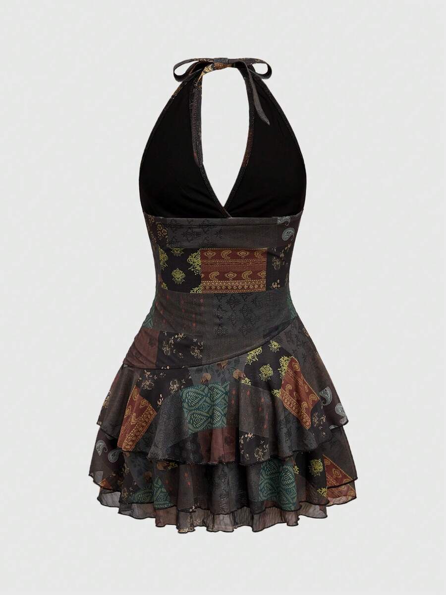 Women's brown boho halter mini dress with backless knot detail, slim fit bodycon shape, all-over mixed print, and layered tiered hem