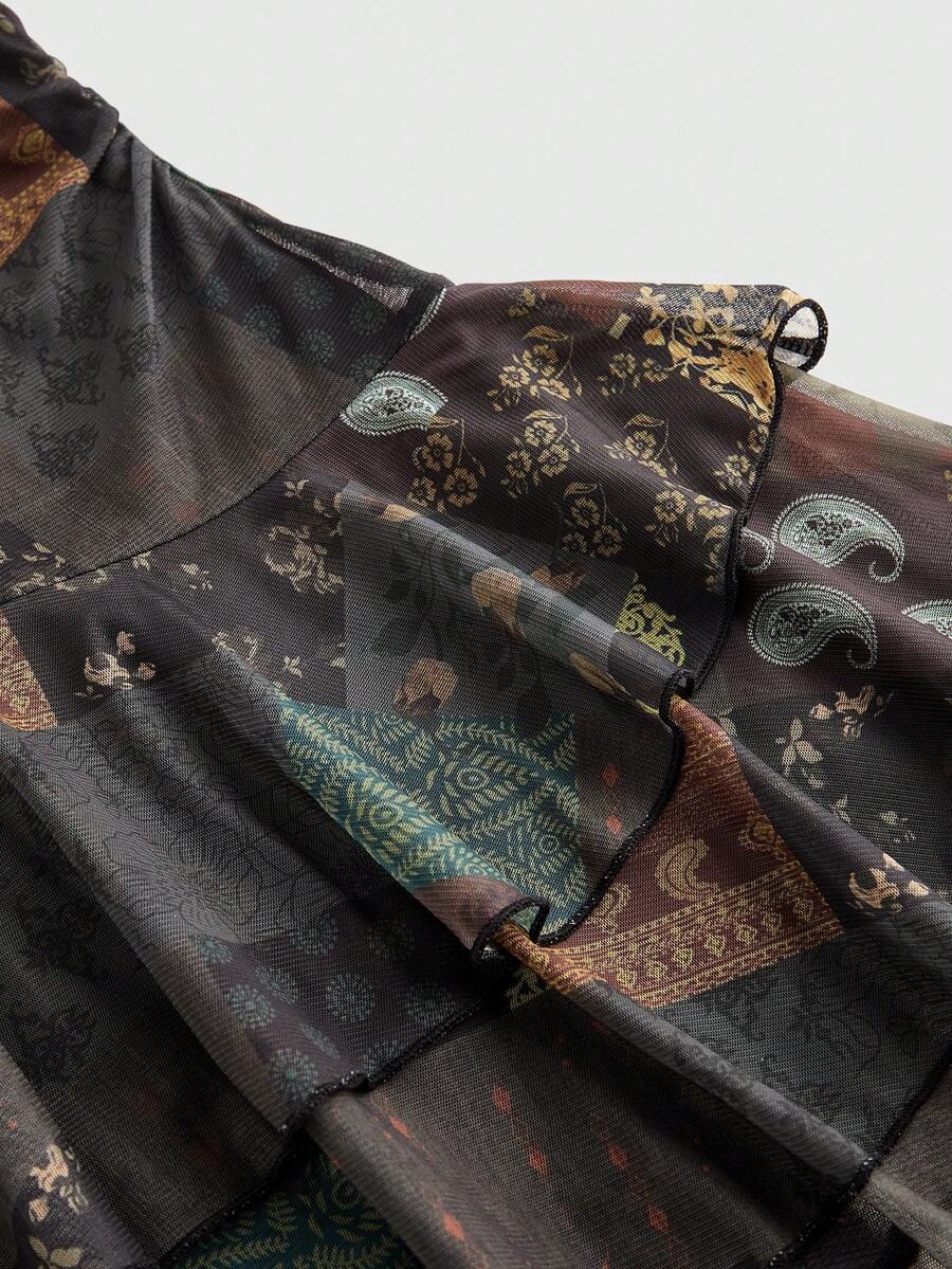 Women's brown boho halter mini dress with backless knot detail, slim fit bodycon shape, all-over mixed print, and layered tiered hem