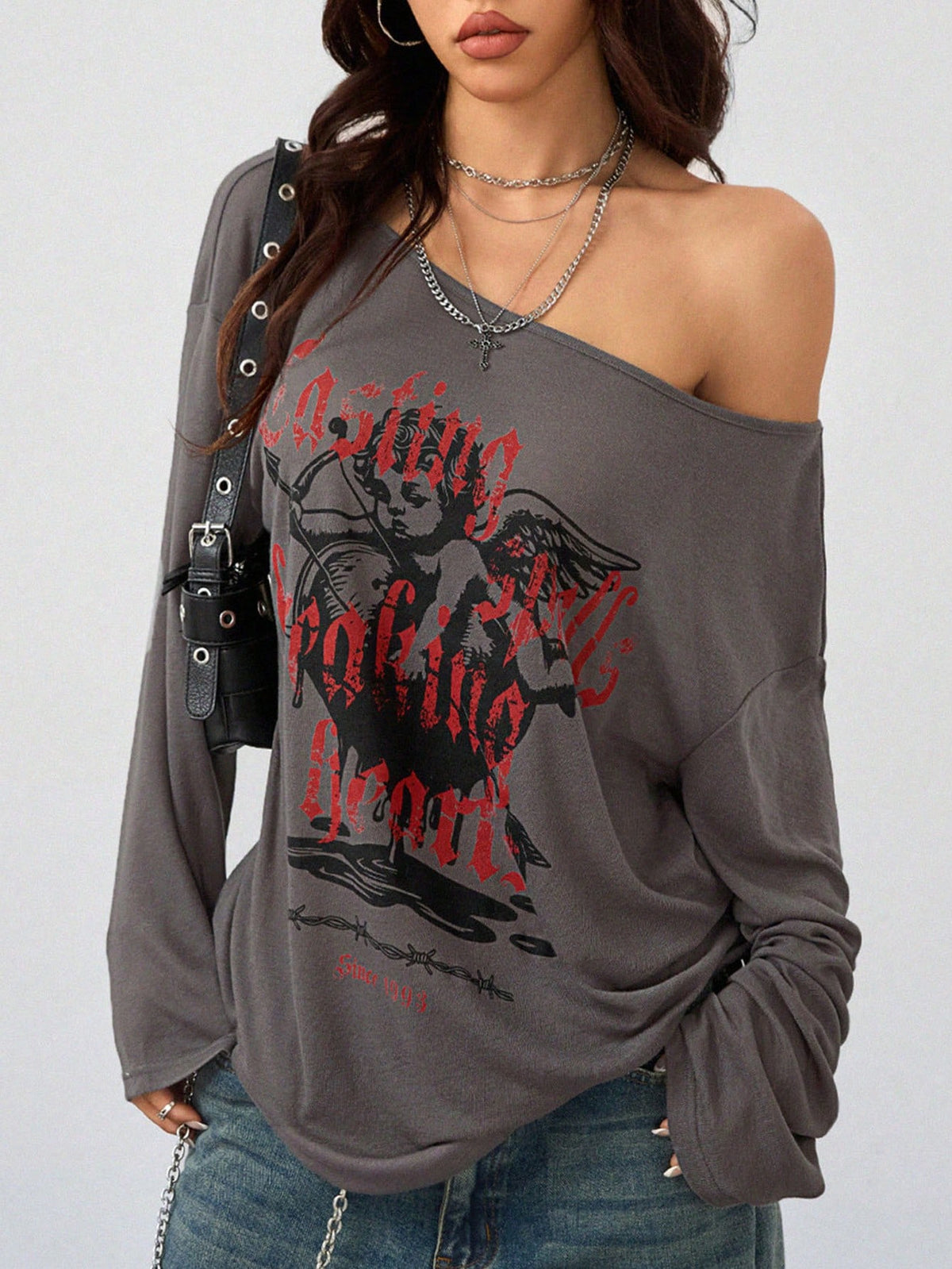 Women's brown striped boat neck long sleeve raglan T-shirt with a loose casual fit