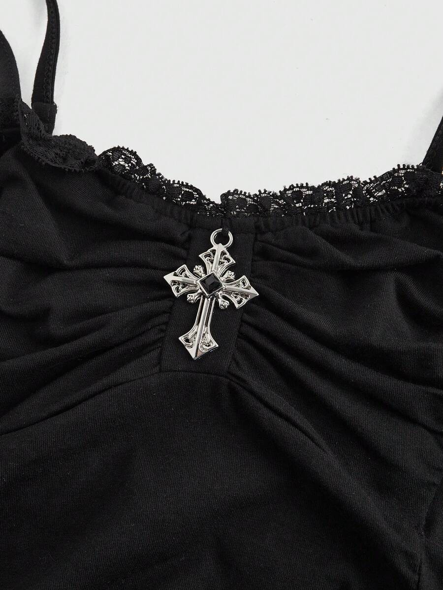 Black gothic spaghetti strap tank top for women featuring contrast lace patchwork, ruched frill details, and a cross pendant accent in a slim fit knitted fabric.