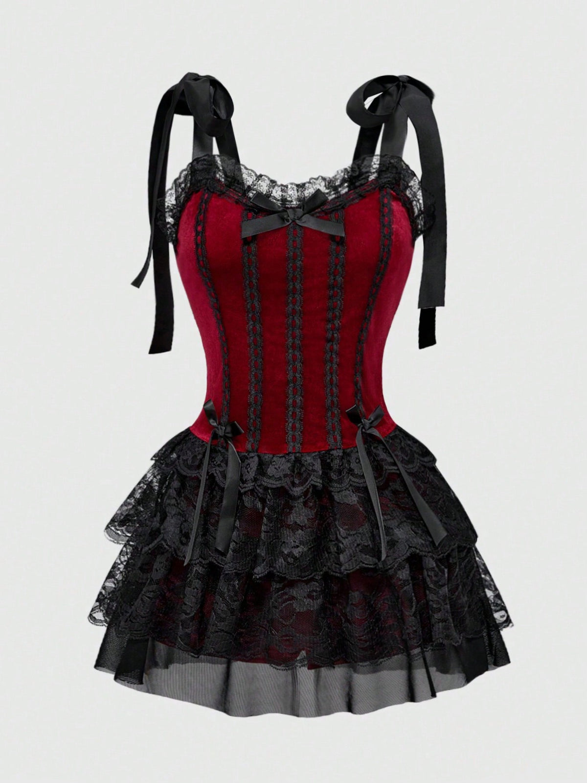 Gothic velvet halter mini dress with contrast lace trim, bow detail, lace-up accents, arm sleeves, layered hem, and cross pendant.