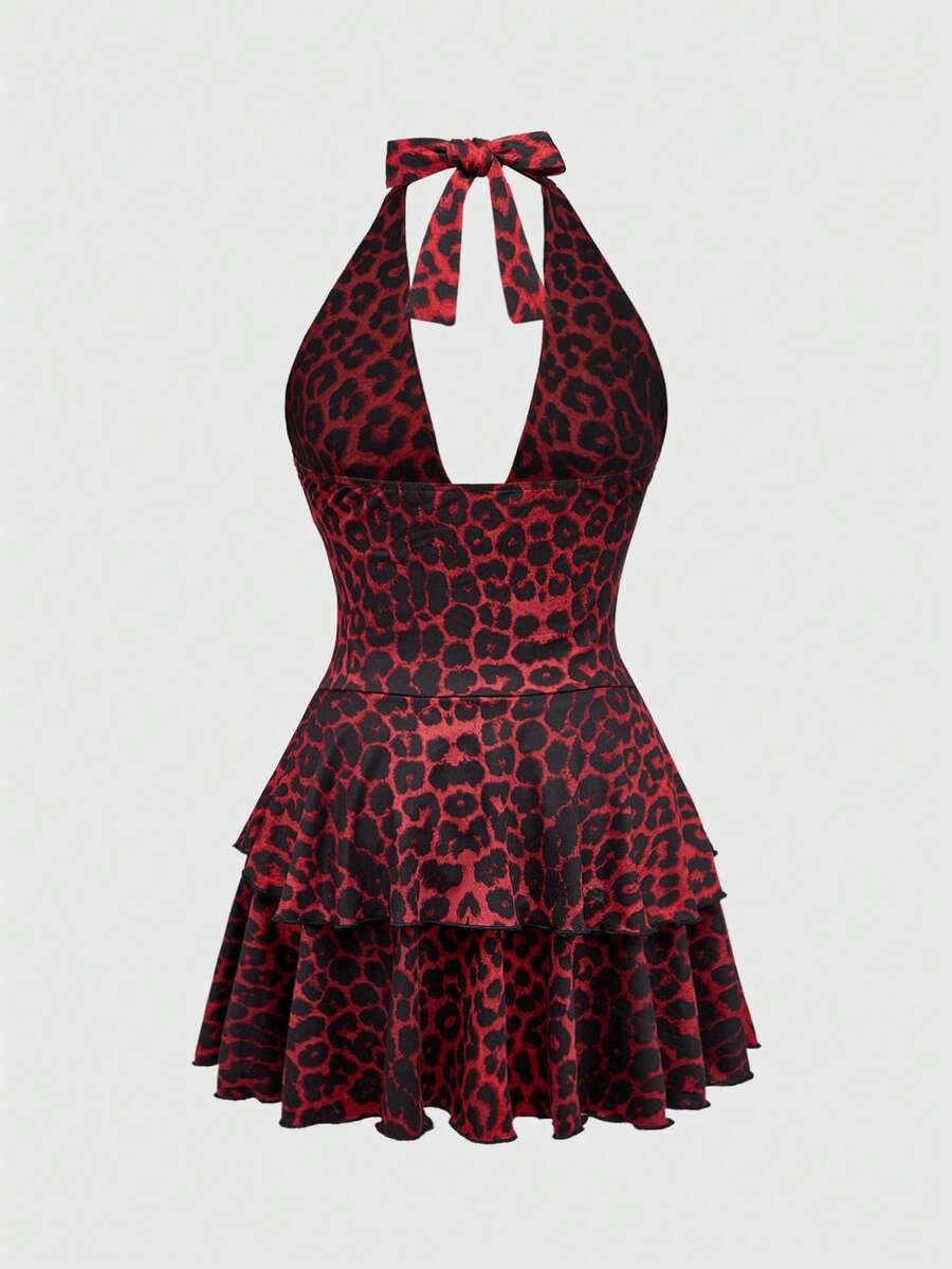 Y2K Harajuku goth style leopard print halter mini dress with backless cut-out details, high waist, sleeveless slim fit, and layered tiered hem.