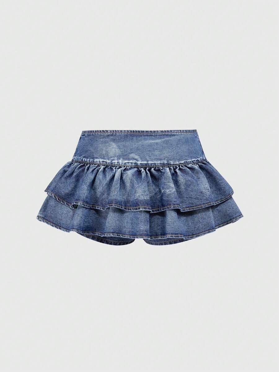 Y2K ultra low waist mini skirt with tiered layer detail, ruffle hem, zipper closure, straight silhouette, and fabric.