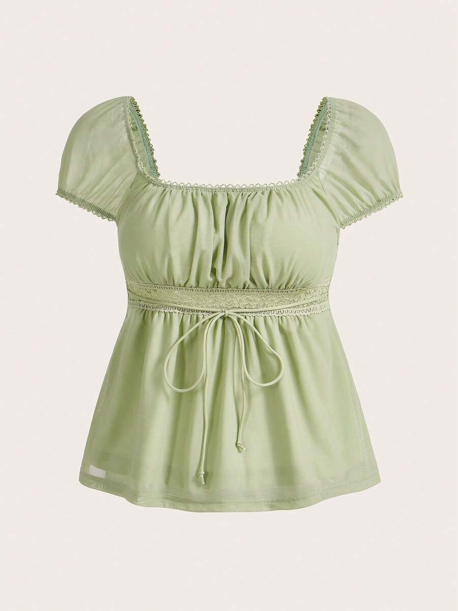 Yellow short puff sleeve tee featuring a square neckline, ruched bust with knot detail, eyelet embroidery, and a gathered waist.