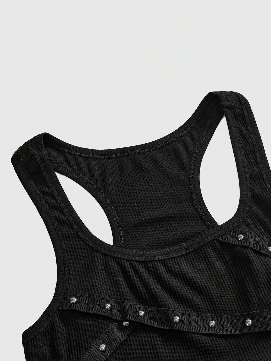 Women's slim fit black tank top featuring a square neckline, ruched styling, and cut out details.