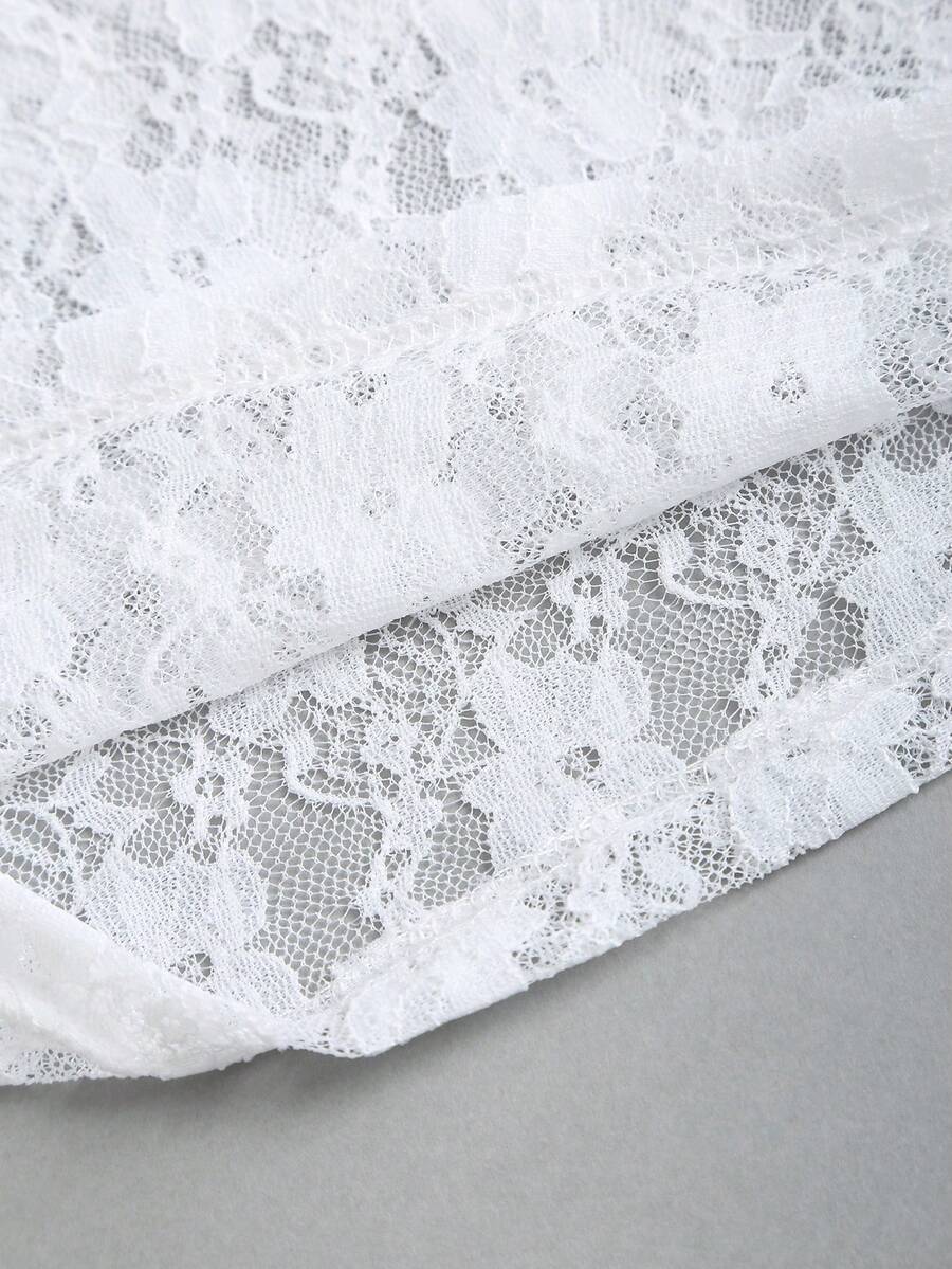 Women's solid lace halter top featuring a backless slim fit design with semi-sheer lace detail.