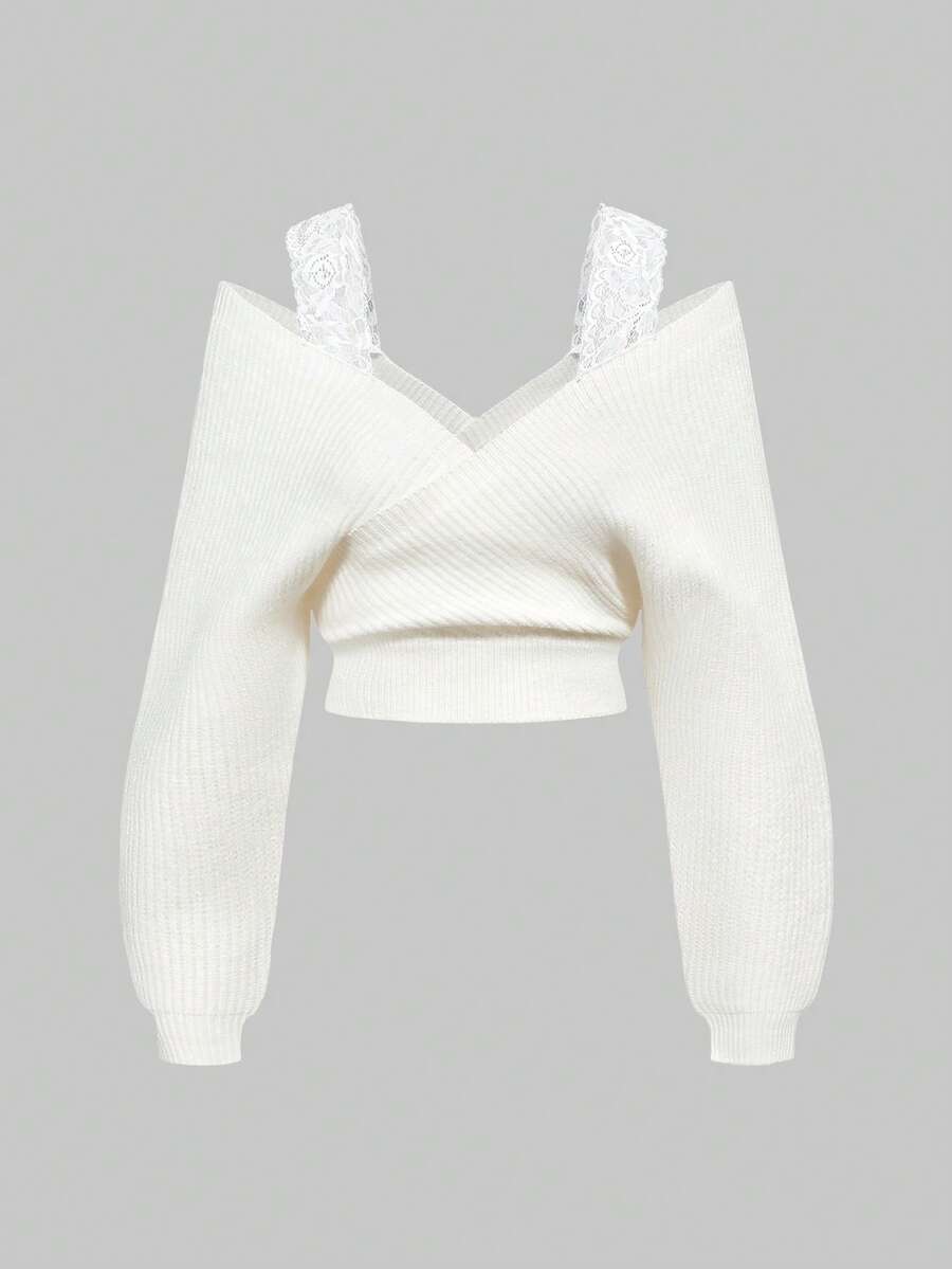Women's two-piece rib-knit sweater set featuring a long-sleeve cold-shoulder crop top with strap details and matching wide-leg pants.
