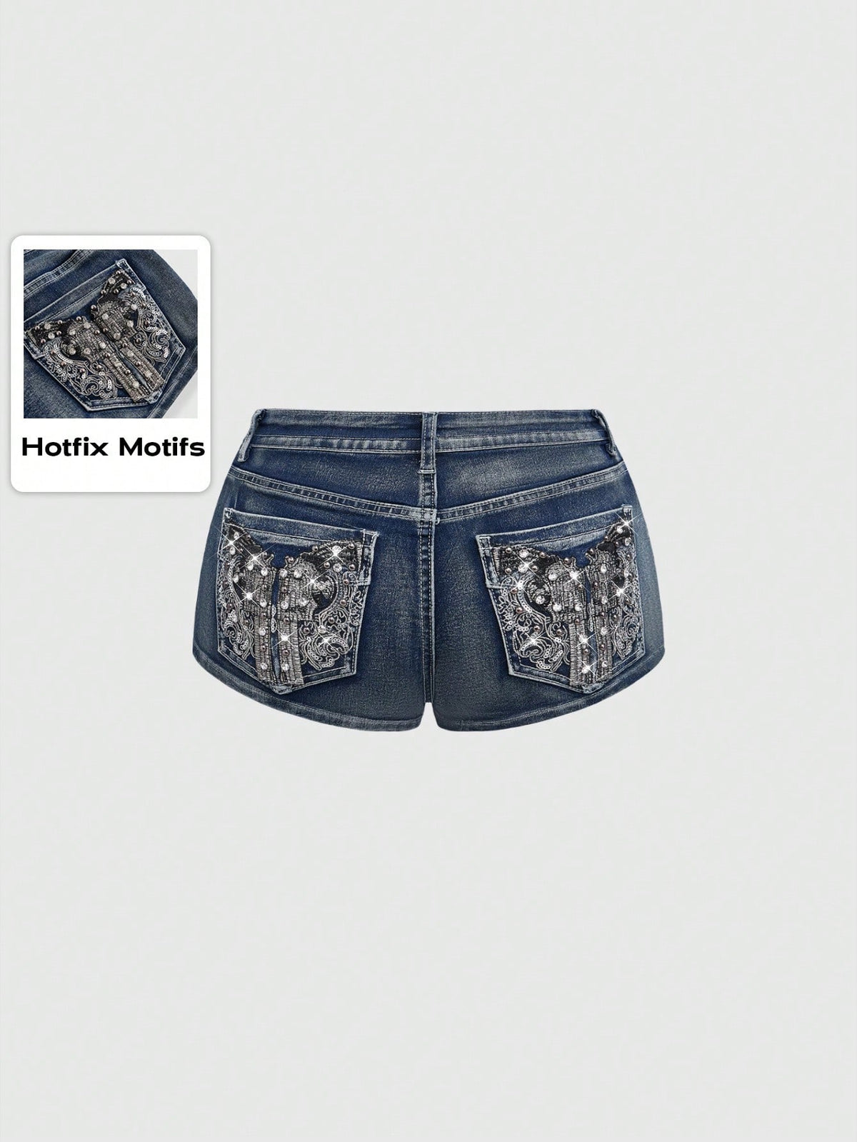 Women's ultra low waist skort with mini shorts length, zipper fly, pockets, pistol embroidery, and rhinestone details