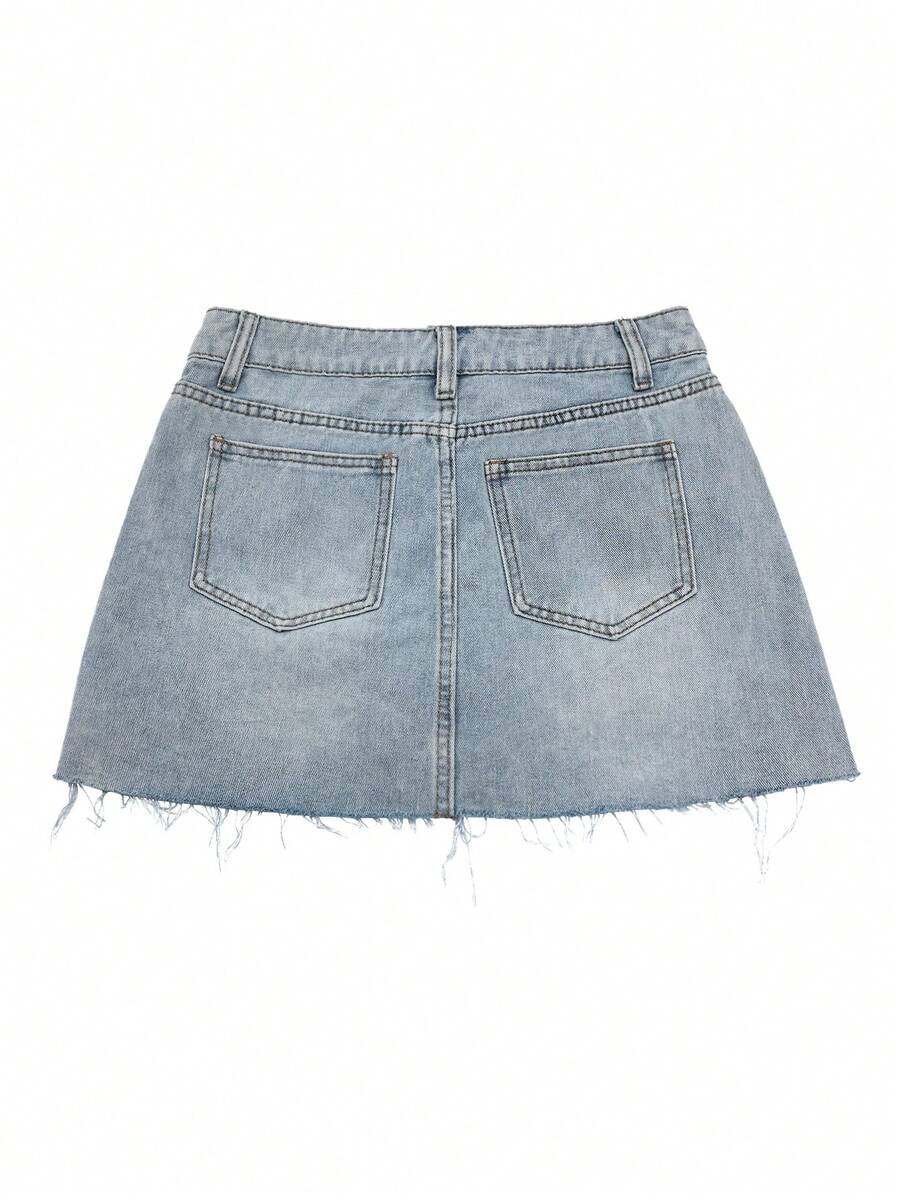 Y2K distressed mini skort with button and pocket details, natural mid waist, regular fit, and casual streetwear styling.