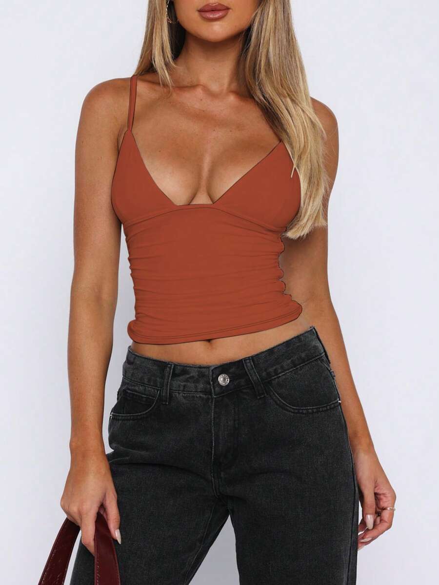 Women's red V-neck backless cami crop top with ruched details in a slim fit knitted style.
