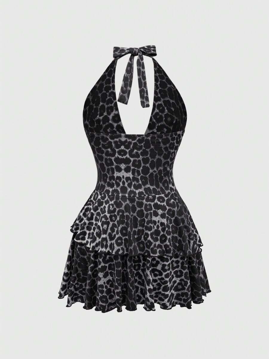 Y2K Harajuku goth style leopard print halter mini dress with backless cut-out details, high waist, sleeveless slim fit, and layered tiered hem.