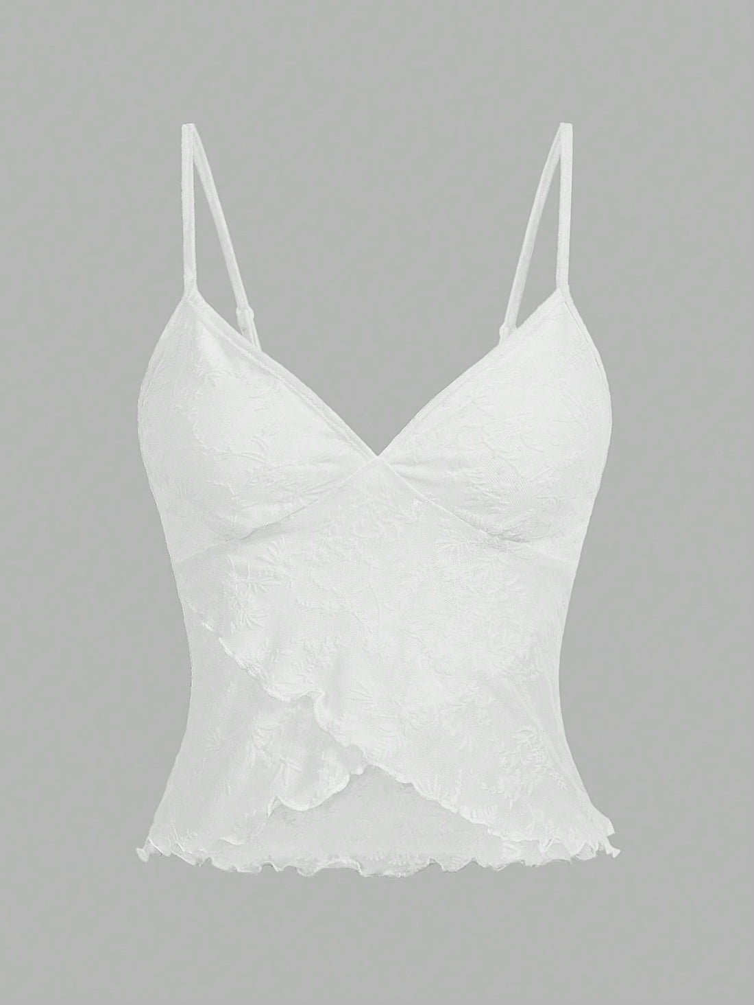 Women's cropped floral flocked camisole with spaghetti straps, backless styling, lettuce trim, asymmetrical hem, and slim fit