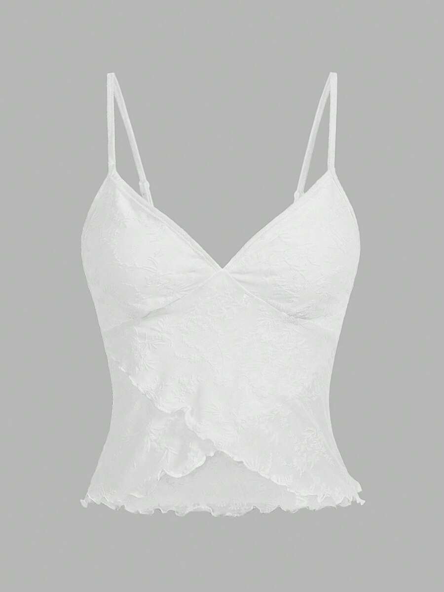 Women's cropped floral flocked camisole with spaghetti straps, backless styling, lettuce trim, asymmetrical hem, and slim fit