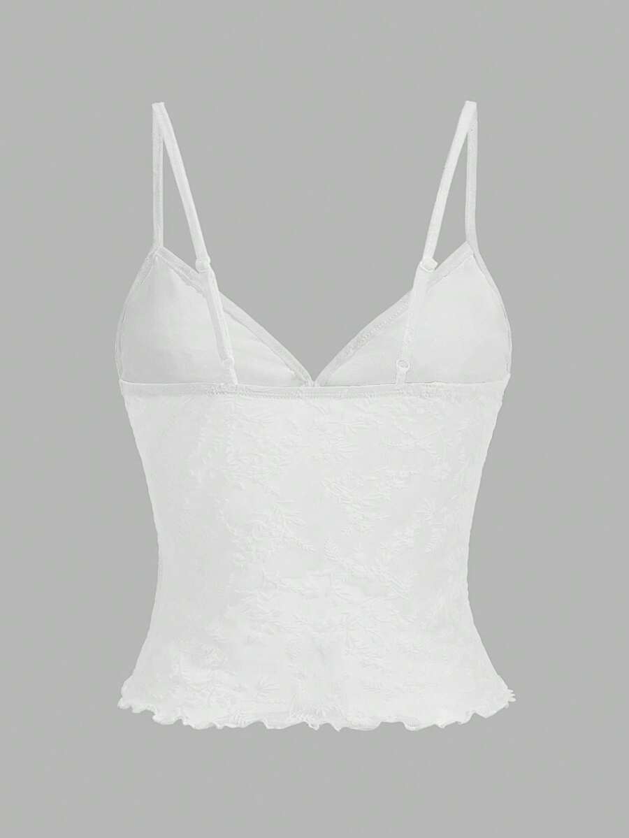 Women's cropped floral flocked camisole with spaghetti straps, backless styling, lettuce trim, asymmetrical hem, and slim fit