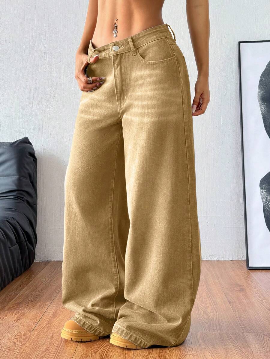Women's casual loose fit wide leg denim jeans with functional pockets and low waist design.