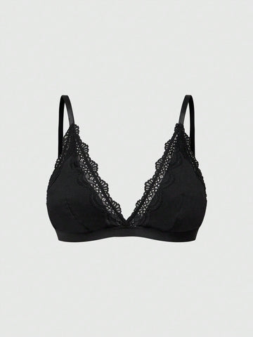 Women's deep V wireless bra with contrast scallop lace patchwork and adjustable straps in soft cotton knit fabric.