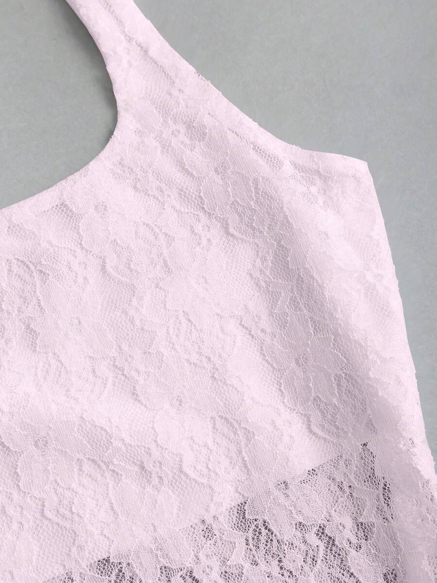 Women's solid lace halter top featuring a backless slim fit design with semi-sheer lace detail.