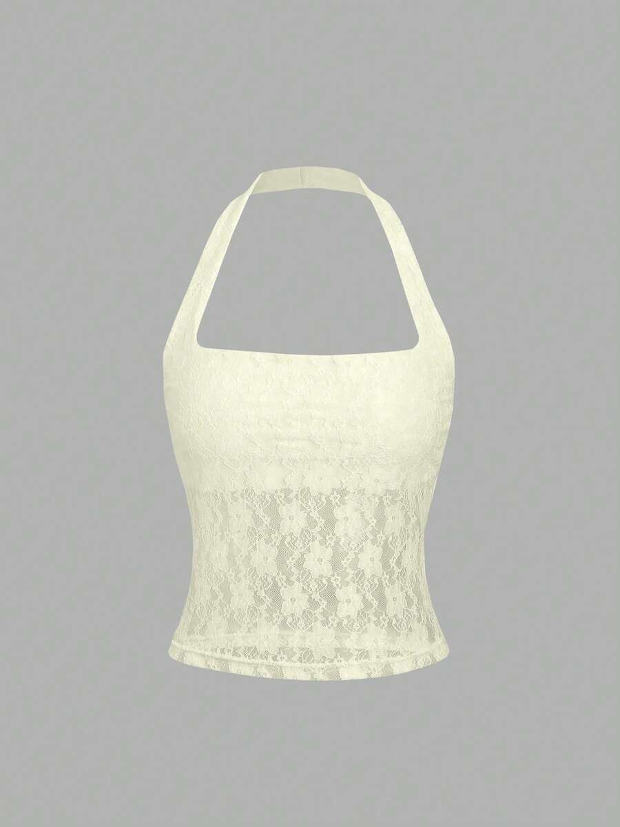 Women's solid lace halter top featuring a backless slim fit design with semi-sheer lace detail.