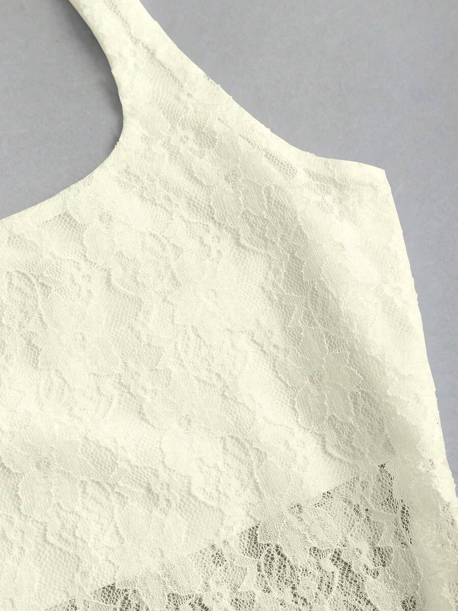Women's solid lace halter top featuring a backless slim fit design with semi-sheer lace detail.