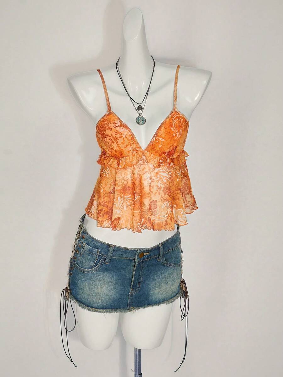 Floral multicolor mesh spaghetti strap cami tank top with backless design, ruffle hem, lettuce trim, and flared long loose fit.