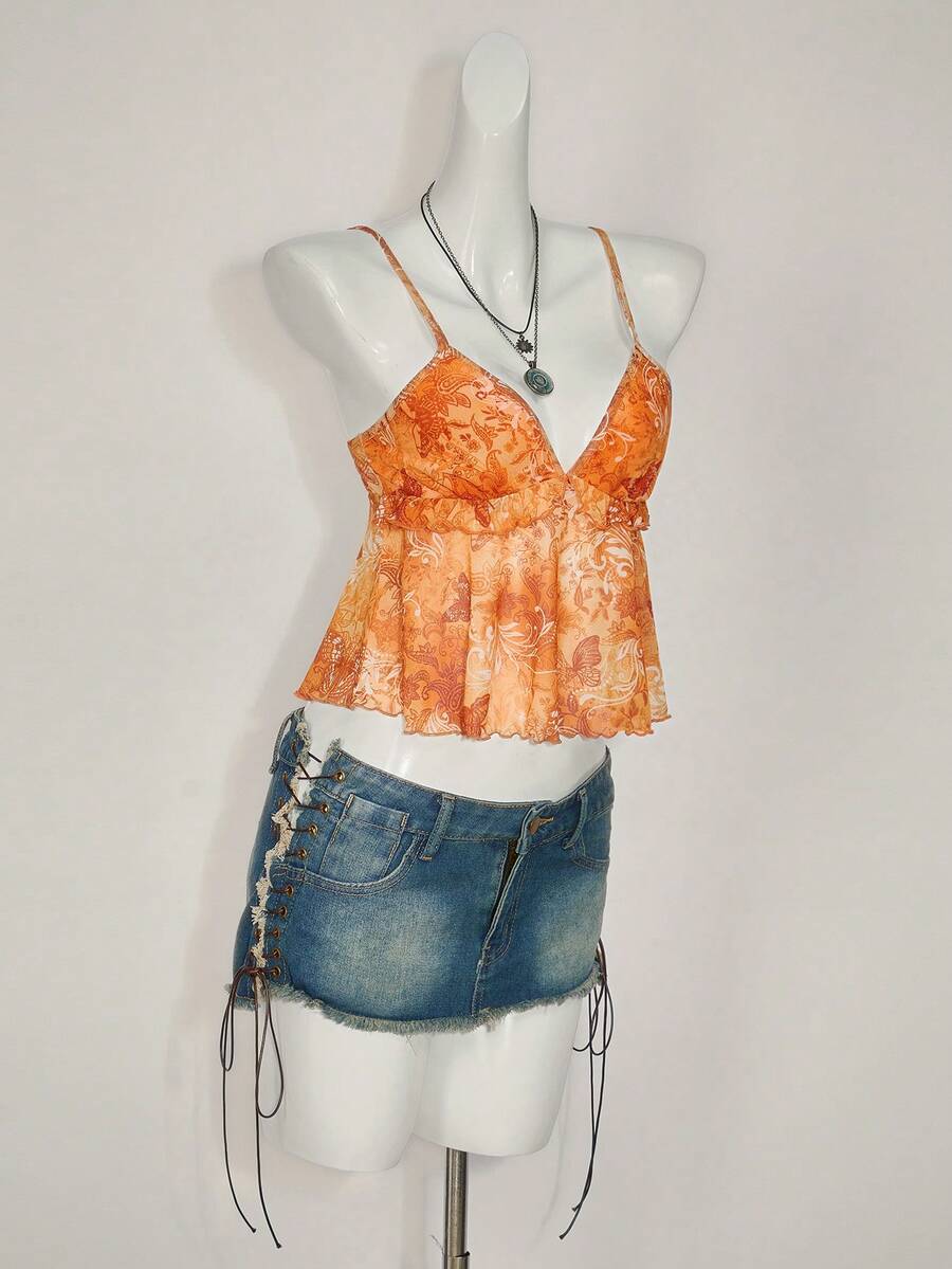Floral multicolor mesh spaghetti strap cami tank top with backless design, ruffle hem, lettuce trim, and flared long loose fit.