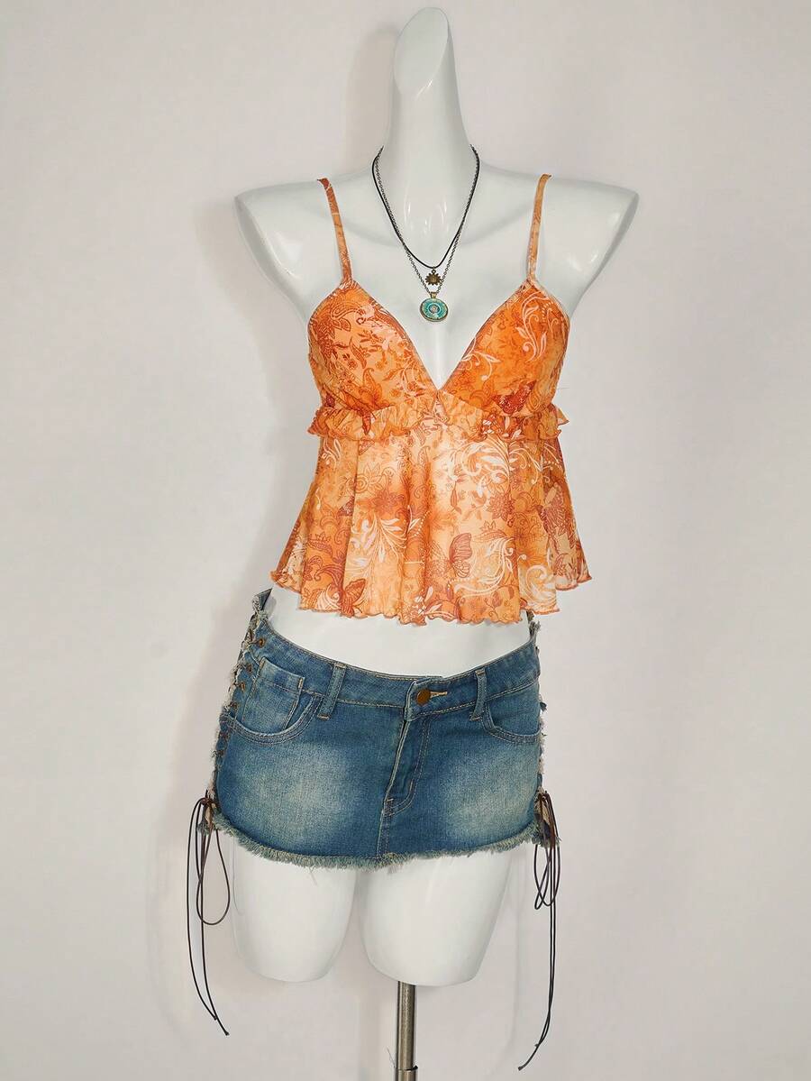Floral multicolor mesh spaghetti strap cami tank top with backless design, ruffle hem, lettuce trim, and flared long loose fit.