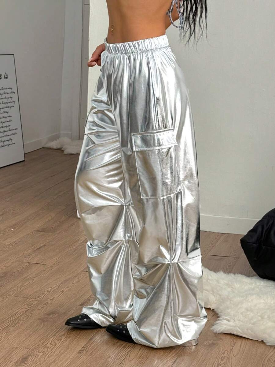 Women's high waist wide leg cargo pants featuring a black and white tree branch print and adjustable drawstring closure.