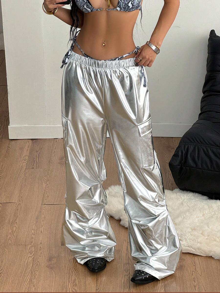 Women's high waist wide leg cargo pants featuring a black and white tree branch print and adjustable drawstring closure.
