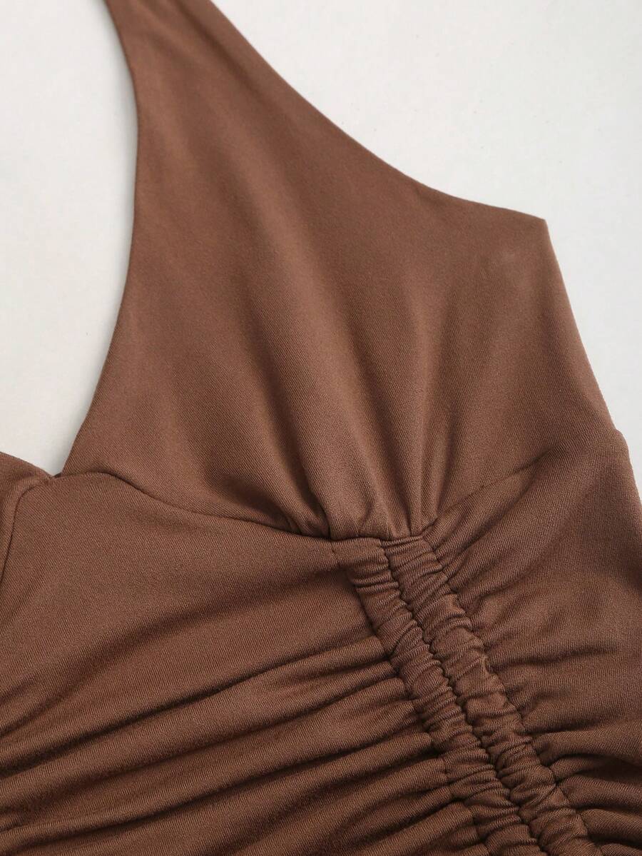 Women's sleeveless halter short dress with a backless design, ruched drawstring detail, slim fit, and asymmetrical hem.