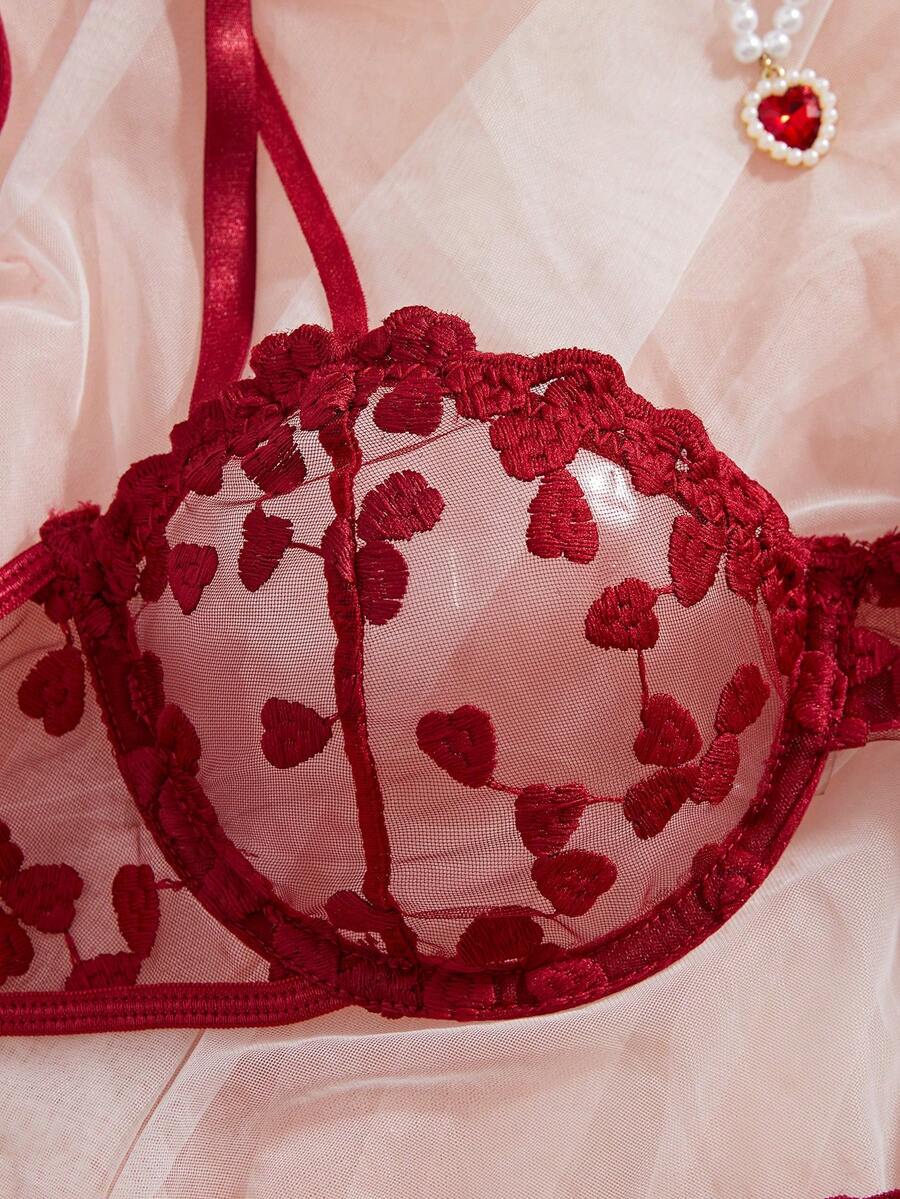 Burgundy heart mesh sheer lingerie set featuring an underwire demi bra and matching cut out thong.